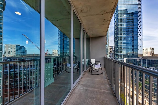 balcony featuring a city view