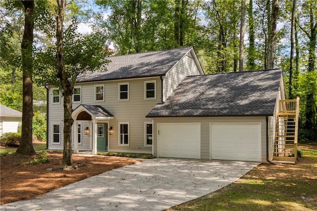 colonial home with a garage