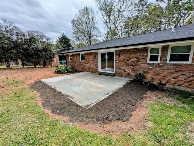 4430 Locksley Rd, Tucker, GA 30084 - back of house featuring a patio and brick siding