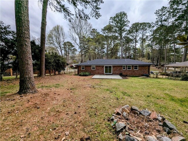 4430 Locksley Rd, Tucker, GA 30084 - view of yard featuring a patio and fence