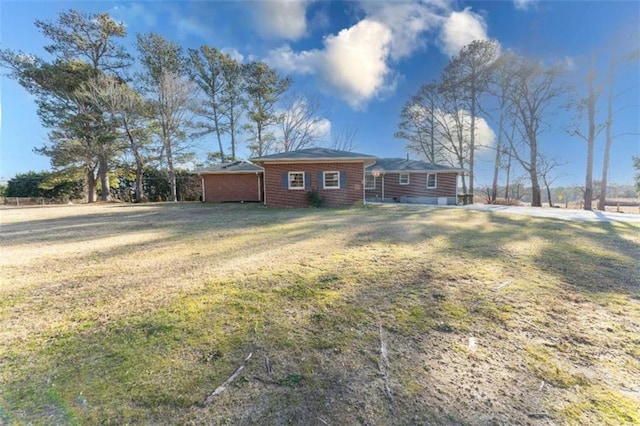 exterior space featuring a front yard