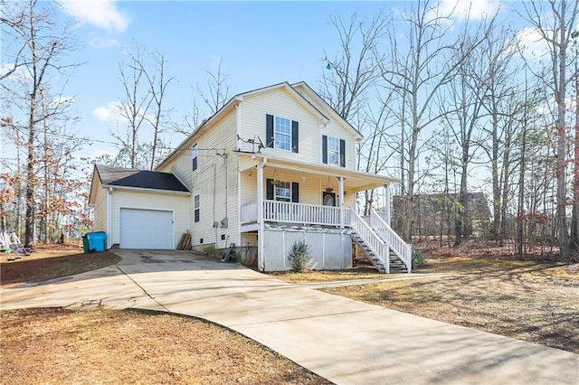 view of front of home with a garage and covered porch