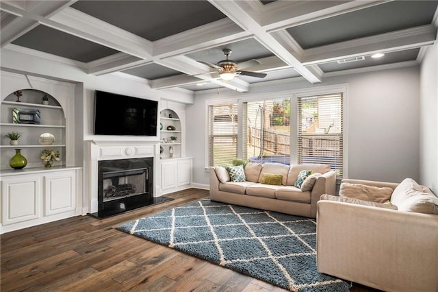 1520 Gallant Fox Ln, Suwanee, GA 30024 - living room featuring dark wood-style flooring, a high end fireplace, a ceiling fan, coffered ceiling, and ornamental molding