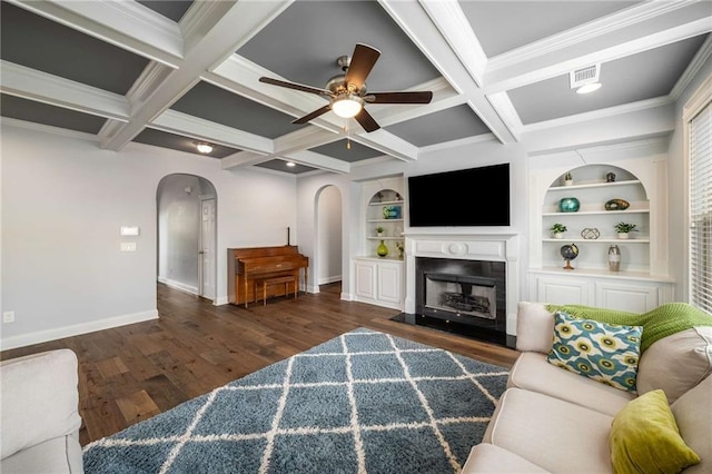 1520 Gallant Fox Ln, Suwanee, GA 30024 - living room with arched walkways, baseboards, wood finished floors, ceiling fan, and crown molding