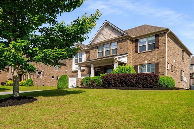 1520 Gallant Fox Ln, Suwanee, GA 30024 - craftsman-style house featuring a front lawn and brick siding