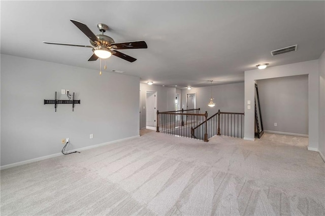 1520 Gallant Fox Ln, Suwanee, GA 30024 - spare room with light carpet, a ceiling fan, and baseboards