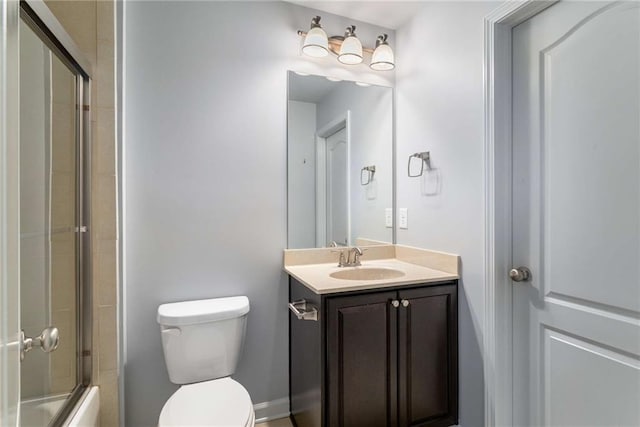 1520 Gallant Fox Ln, Suwanee, GA 30024 - full bathroom with toilet, vanity, and enclosed tub / shower combo