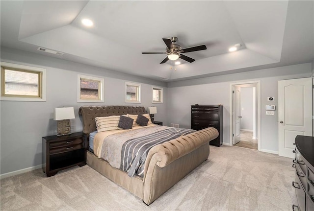 1520 Gallant Fox Ln, Suwanee, GA 30024 - bedroom featuring a tray ceiling, light colored carpet, baseboards, recessed lighting, and multiple windows