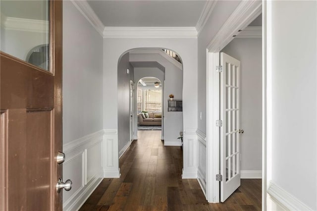 1520 Gallant Fox Ln, Suwanee, GA 30024 - hall featuring arched walkways, wood finished floors, and ornamental molding