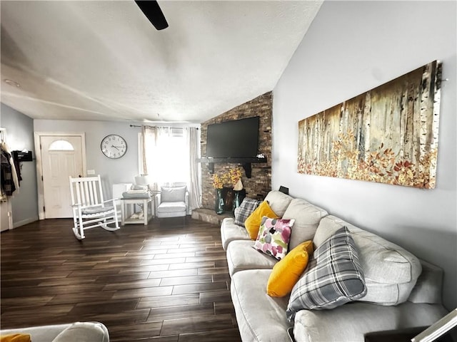 living room with vaulted ceiling and dark wood finished floors