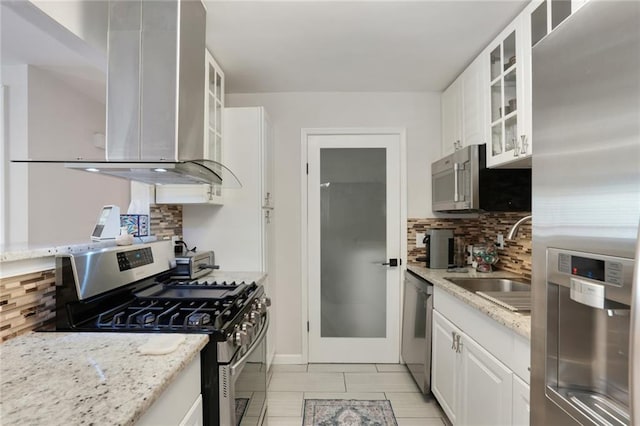 3210 Lake Pointe Cir, Roswell, GA 30075 - kitchen with stainless steel appliances, backsplash, white cabinetry, and light stone counters
