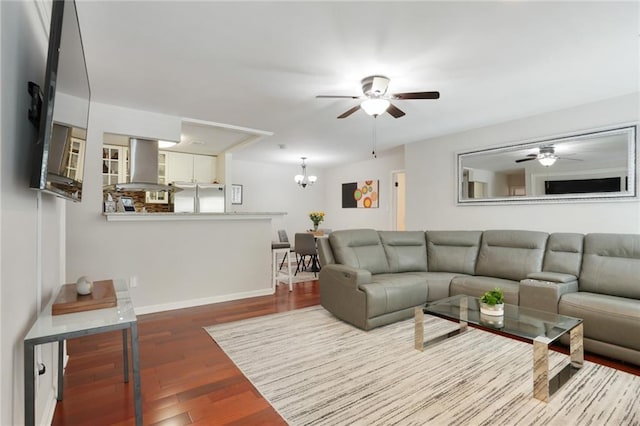 3210 Lake Pointe Cir, Roswell, GA 30075 - living room with a ceiling fan, wood finished floors, and a chandelier