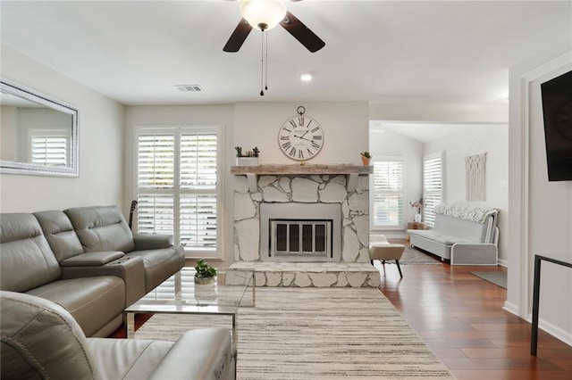 3210 Lake Pointe Cir, Roswell, GA 30075 - living room featuring a ceiling fan, plenty of natural light, a fireplace, and wood finished floors