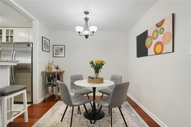 3210 Lake Pointe Cir, Roswell, GA 30075 - dining space with dark wood finished floors and a chandelier