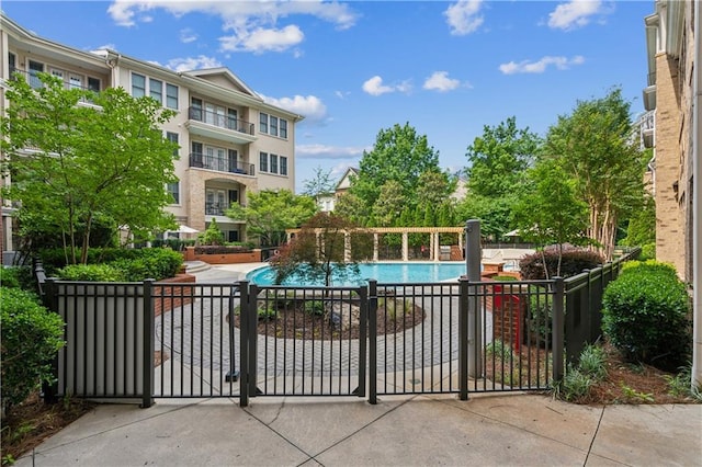 3621 Vinings Slope SE Unit 3510, Atlanta, GA 30339 - gate featuring a community pool