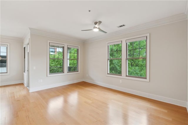3621 Vinings Slope SE Unit 3510, Atlanta, GA 30339 - unfurnished room featuring ornamental molding, a ceiling fan, light wood-type flooring, and baseboards