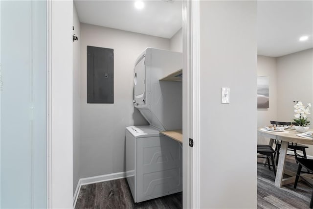 96 Senoia Rd, Fairburn, GA 30213 - washroom with stacked washer / dryer, electric panel, wood finished floors, and recessed lighting
