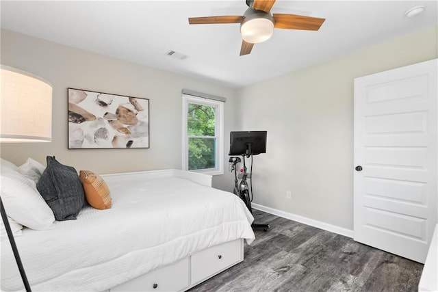 96 Senoia Rd, Fairburn, GA 30213 - bedroom featuring dark wood-type flooring and a ceiling fan