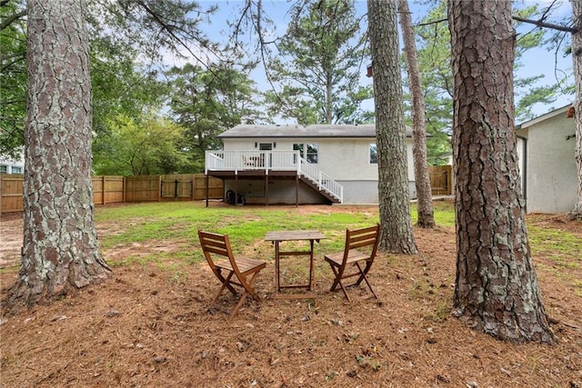 96 Senoia Rd, Fairburn, GA 30213 - rear view of property with a deck, stairway, and a fenced backyard