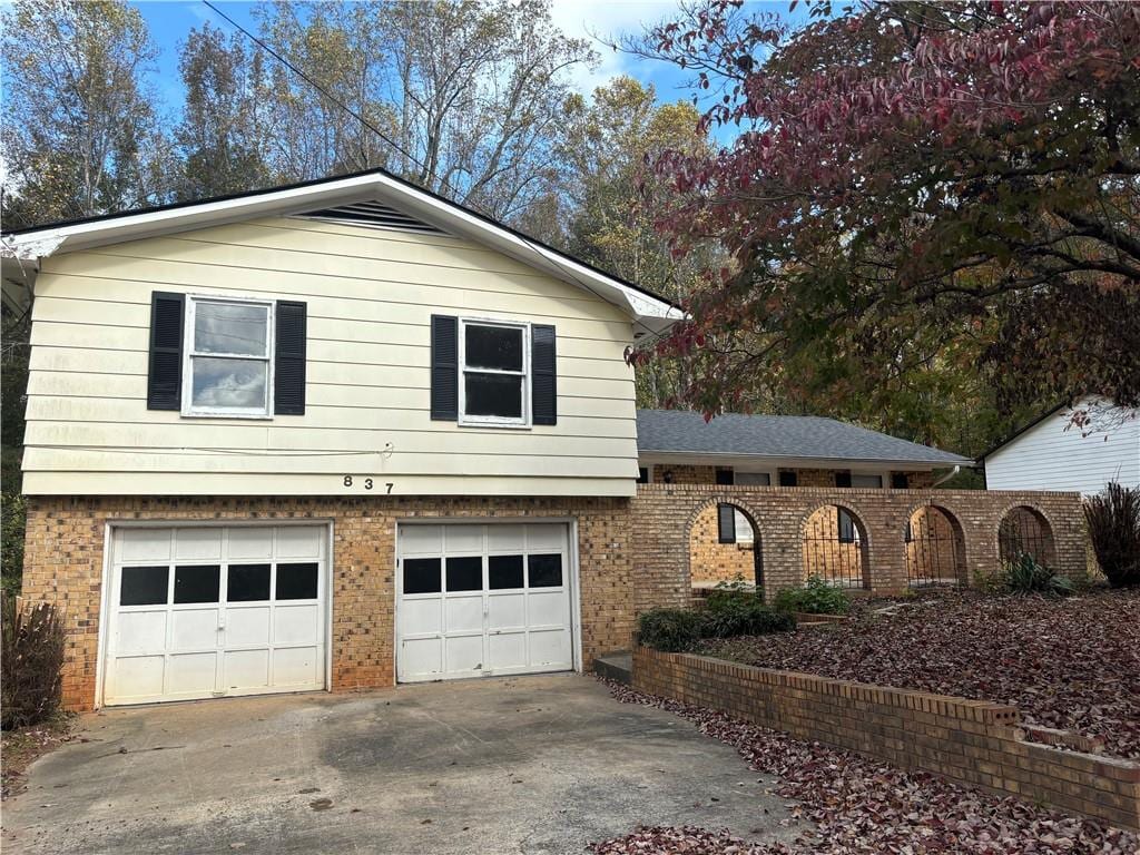 split level home featuring a garage