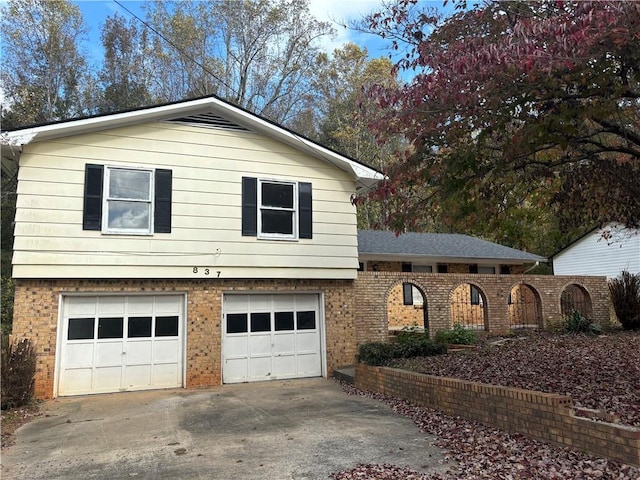 split level home featuring a garage