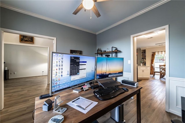 office space with wood finished floors, a ceiling fan, and crown molding