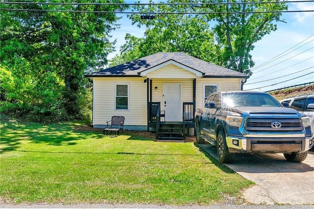 1357 Railroad Ave, Sugar Hill, GA 30518 - bungalow featuring a front lawn and a shingled roof