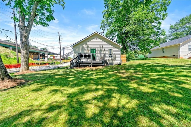 1357 Railroad Ave, Sugar Hill, GA 30518 - back of house with a yard and a wooden deck
