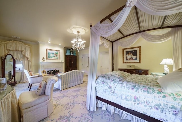 bedroom featuring crown molding, light carpet, and a chandelier