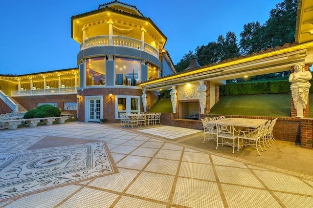 back of house featuring french doors and a patio area