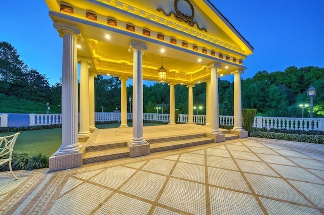 view of patio terrace at night