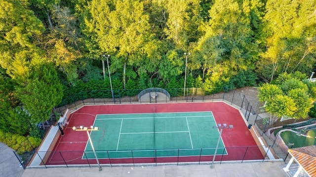 exterior space featuring tennis court