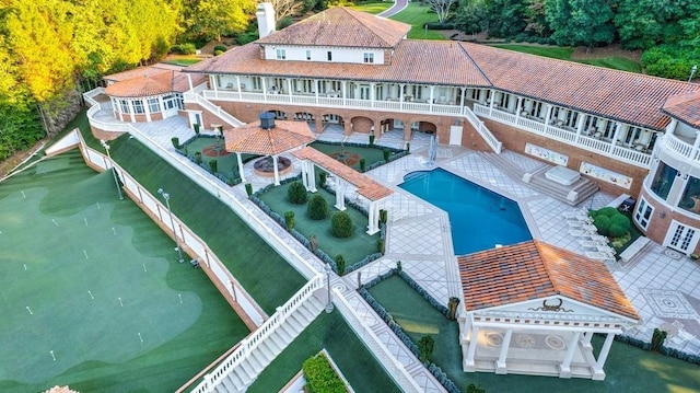 view of pool featuring a patio