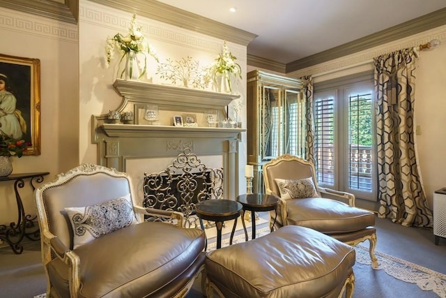 living area with crown molding and dark colored carpet