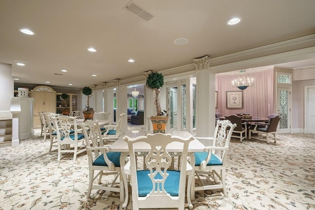 dining space with an inviting chandelier, crown molding, and light carpet