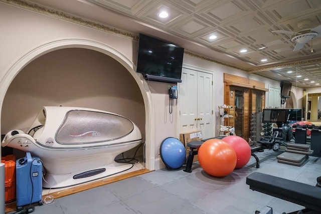 workout area featuring tile floors