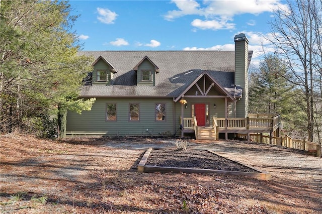 view of front of home with a wooden deck