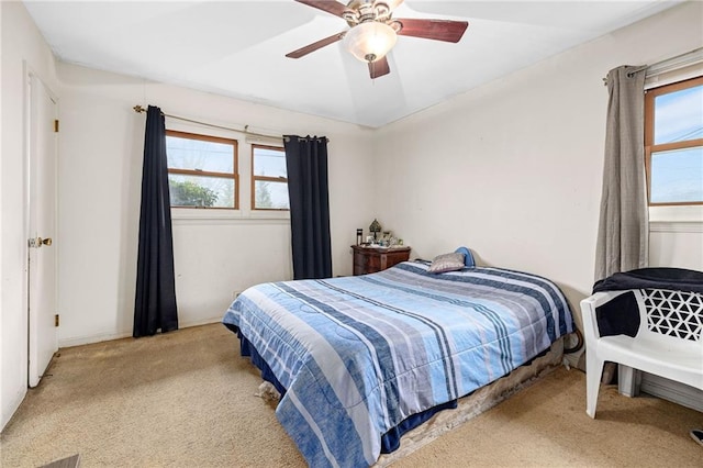 bedroom with carpet flooring and a ceiling fan