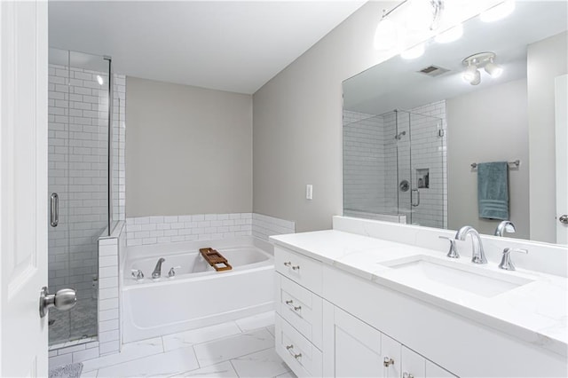 bathroom with marble finish floor, visible vents, a stall shower, vanity, and a bath