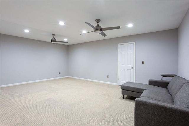 living area with recessed lighting, light colored carpet, and ceiling fan