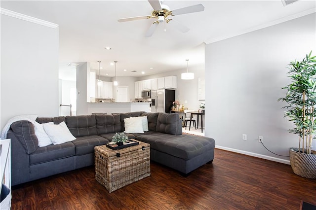 living room featuring baseboards, dark wood-type flooring, recessed lighting, and crown molding