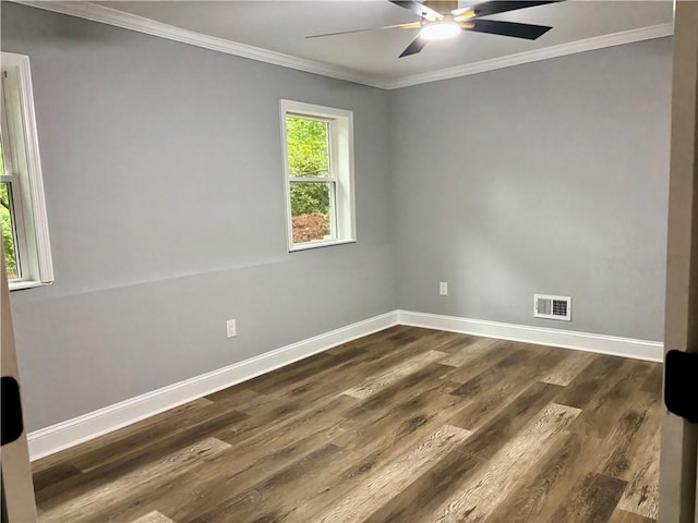 unfurnished room featuring ceiling fan, crown molding, baseboards, and dark wood-style floors