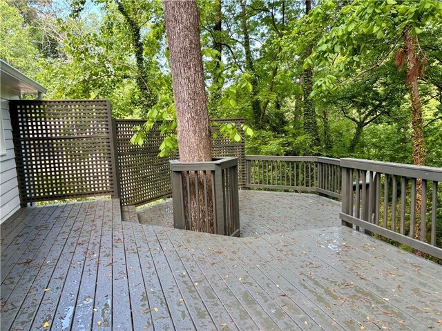 deck with view of scattered trees