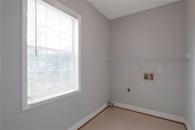 2157 Brandon Lee Dr SW, Marietta, GA 30008 - laundry area featuring hookup for a washing machine, hookup for an electric dryer, and baseboards