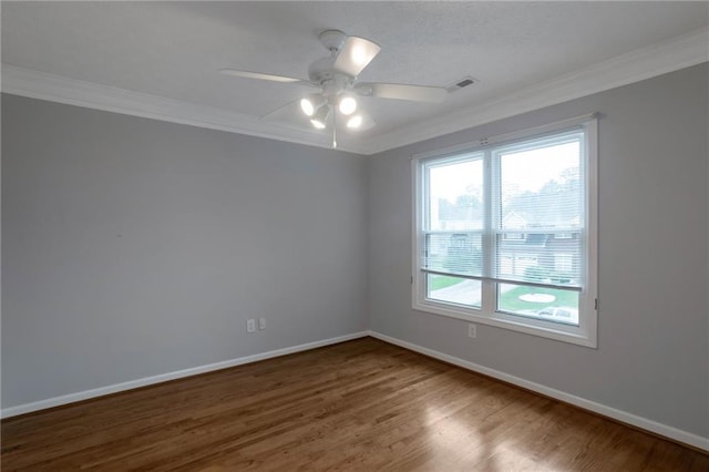 2157 Brandon Lee Dr SW, Marietta, GA 30008 - unfurnished room with crown molding, wood finished floors, a ceiling fan, and baseboards