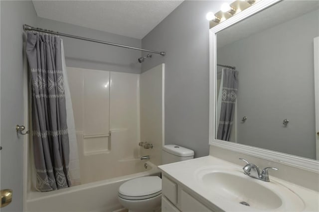 2157 Brandon Lee Dr SW, Marietta, GA 30008 - full bath with toilet, shower / bathtub combination with curtain, vanity, and a textured ceiling
