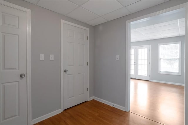 2157 Brandon Lee Dr SW, Marietta, GA 30008 - hall with a paneled ceiling, light wood-style flooring, and baseboards