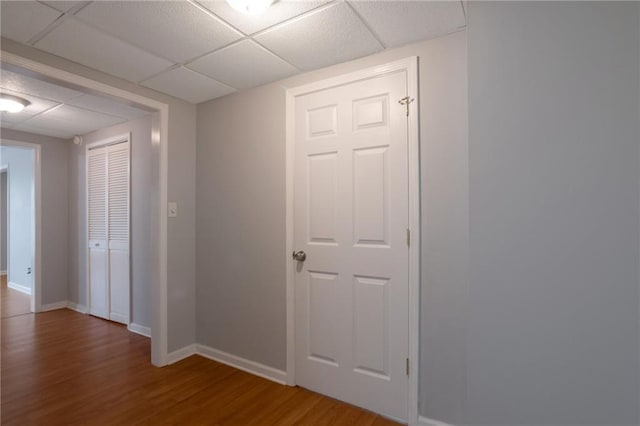 2157 Brandon Lee Dr SW, Marietta, GA 30008 - hallway featuring wood finished floors, a drop ceiling, and baseboards