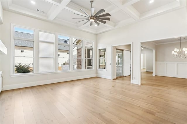 unfurnished sunroom featuring visible vents, coffered ceiling, beam ceiling, and ceiling fan with notable chandelier