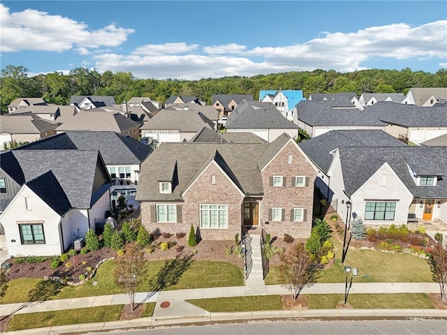 drone / aerial view featuring a residential view